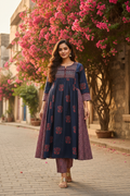 Model wearing navy blue lotus print kurta with matching ajrakh printed pants